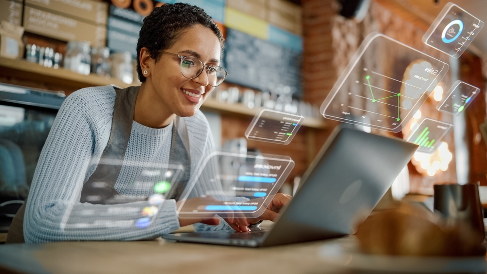 A woman using a laptop.