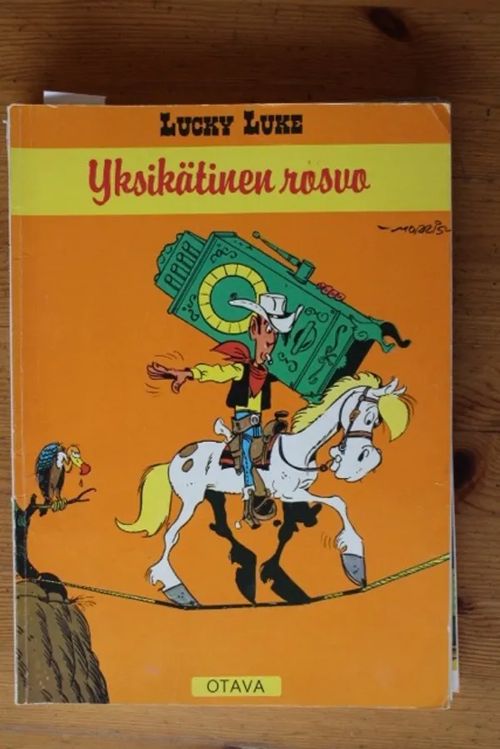 Lucky Luke - Yksikätinen rosvo | Antikvaarinen Kirjakauppa Tessi | Osta Antikvaarista - Kirjakauppa verkossa