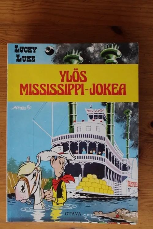 Lucky Luke - Ylös Mississippi-jokea | Antikvaarinen Kirjakauppa Tessi | Osta Antikvaarista - Kirjakauppa verkossa