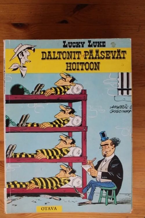 Lucky Luke - Daltonit pääsevät hoitoon | Antikvaarinen Kirjakauppa Tessi | Osta Antikvaarista - Kirjakauppa verkossa