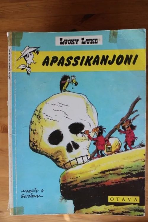 Lucky Luke - Apassikanjoni | Antikvaarinen Kirjakauppa Tessi | Osta Antikvaarista - Kirjakauppa verkossa