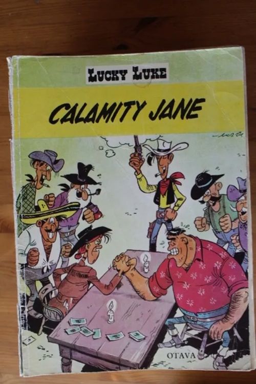 Lucky Luke - Calamity Jane | Antikvaarinen Kirjakauppa Tessi | Osta Antikvaarista - Kirjakauppa verkossa