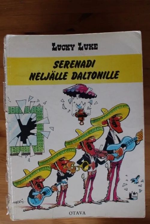 Lucky Luke - Serenadi neljälle Daltonille | Antikvaarinen Kirjakauppa Tessi | Osta Antikvaarista - Kirjakauppa verkossa