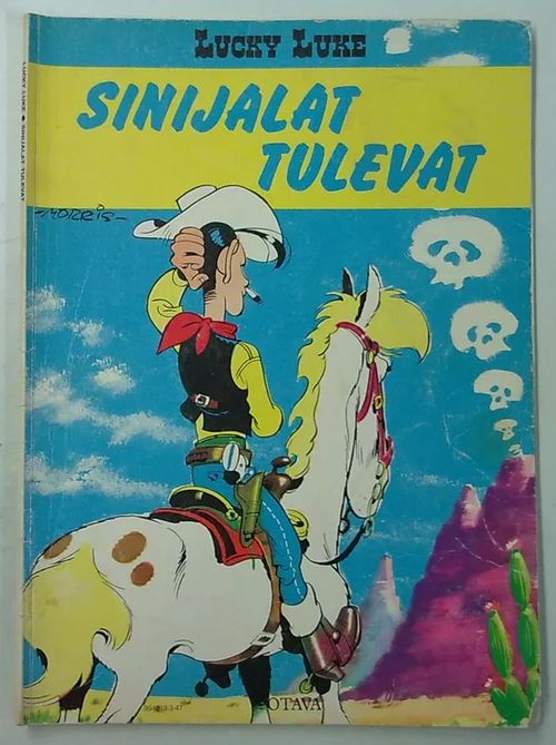 Lucky Luke - Sinijalat tulevat | Antikvaarinen Kirjakauppa Tessi | Osta Antikvaarista - Kirjakauppa verkossa