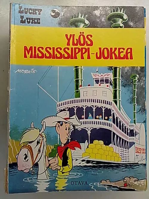 Lucky Luke - Ylös Mississippi-jokea | Antikvaarinen Kirjakauppa Tessi | Osta Antikvaarista - Kirjakauppa verkossa