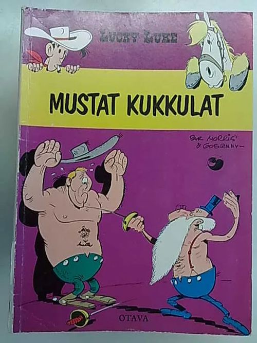 Lucky Luke - Mustat kukkulat | Antikvaarinen Kirjakauppa Tessi | Osta Antikvaarista - Kirjakauppa verkossa