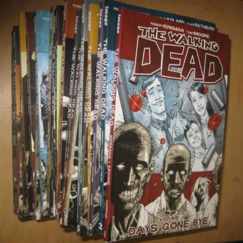 The Walking Dead 1-23 & 25 - Kirkman Robert, Moore Tony, Adlard Charlie, Rathburn Cliff, Gaudiano Stefano | Divari & Antikvariaatti Kummisetä | Osta Antikvaarista - Kirjakauppa verkossa