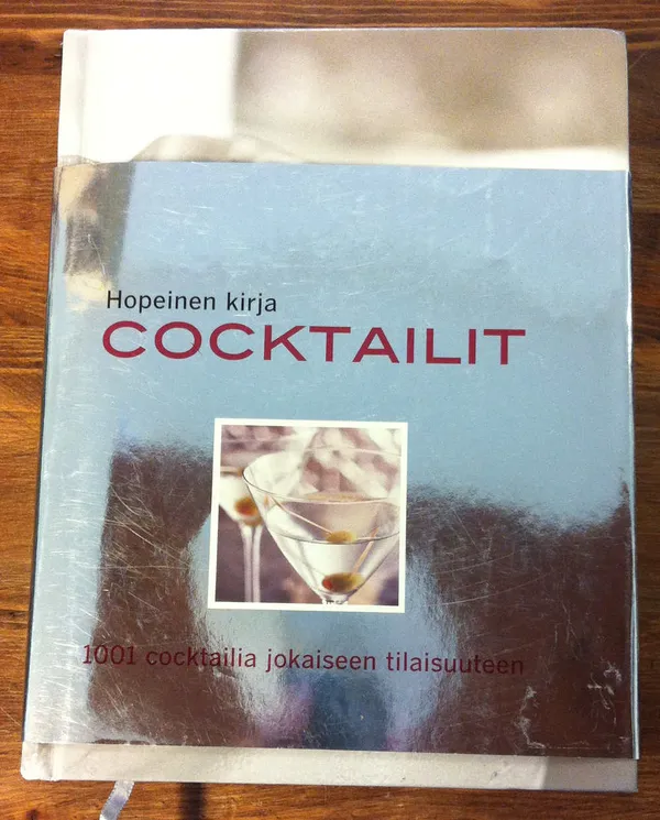 Hopeinen kirja coctailit - 1001 cocktailia jokaiseen tilaisuuteen - Lahtinen Tapani | Cityn Kirja | Osta Antikvaarista - Kirjakauppa verkossa