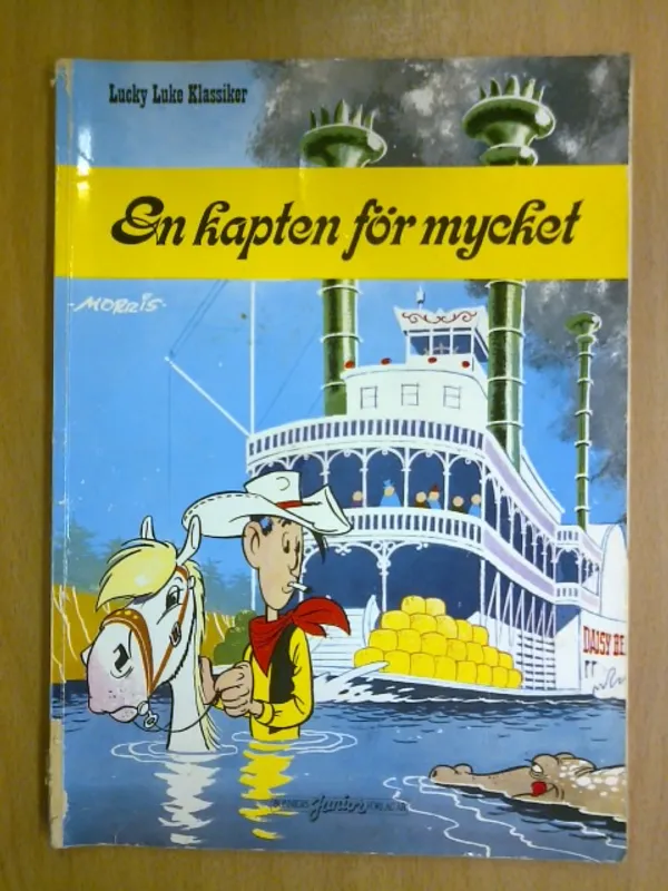 Lucky Luke - En kapten för mycket - Morris Morris | Kirja Waldemar | Osta Antikvaarista - Kirjakauppa verkossa