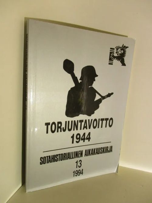 Sotahistoriallinen aikakauskirja 13 - Torjuntavoitto 1944 [Sis. mm. Juutilainen: Valkeasaaresta Ilomantsiin. Maasotatoimet 10.6.-13.8.1944 21s., Wihtol: Meripuolustus 1944 - aukeaako Suomenlahti 58s., Geust: Helsingin ja Kannaksen taivaalla 1944 - Neuvostoliiton kaukopommitusilmavoimien toiminnasta 40s., Manninen: Neuvostojoukot Suomen rajoilla kesällä 1944 27s.] | Brahen Antikvariaatti | Osta Antikvaarista - Kirjakauppa verkossa