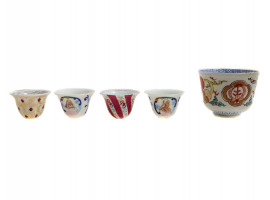 A SET OF FIVE ANTIQUE ISLAMIC CUPS