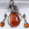 A JEWELRY SET OF AMBER & SILVER RINGS AND PENDANT PIC-1