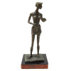 A BRONZE STATUE OF A DANCER WOMAN IN A DRESS PIC-0