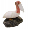 A VINTAGE HAND-CARVED FIGURINE OF A PELICAN PIC-0