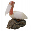 A VINTAGE HAND-CARVED FIGURINE OF A PELICAN PIC-1