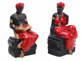 A PAIR OF ALEXANDER BACKER CO BOOKENDS FIGURINES