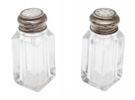 AN ANTIQUE SILVER SALT AND PEPPER SHAKERS