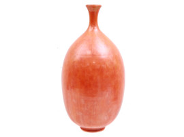 AN ARTISTIC GLAZED CERAMIC ORANGE VASE