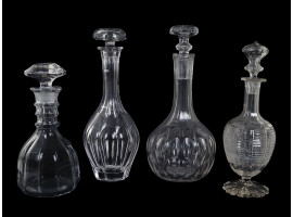 FOUR VINTAGE CRYSTAL CUT GLASS DECANTERS