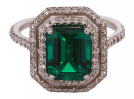 PLATINIUM, DIAMONDS AND EMERALD COCKTAIL RING