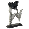 AUSTIN PRODUCTIONS METAL FIGURE OF WOMAN WITH DOG PIC-1