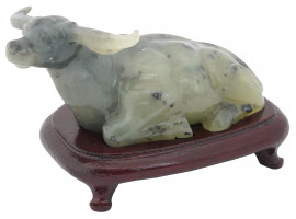 CARVED JADE FIGURE OF A BUFFALO ON WOOD STAND