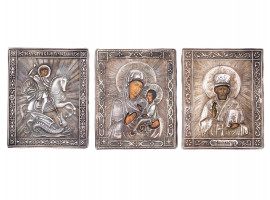 RUSSIAN ICONS OF SAINTS IN SILVER REPOUSSE OKLAD