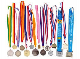 LOT OF FIFTEEN WORLD SPORT MEDALS WITH RIBBONS