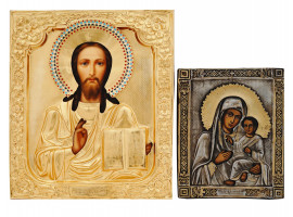 TWO RUSSIAN ORTHODOX ICONS IN GILT OKLADS