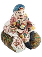 JAPANESE MEIJI GLAZED PORCELAIN DAIKOKU FIGURINE