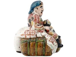 JAPANESE MEIJI GLAZED PORCELAIN DAIKOKU FIGURINE