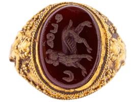 ROMAN GOLD AND HAND CARVED CARNELIAN INTAGLIO RING