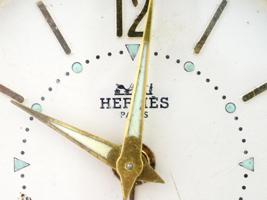 MID CENT HERMES GILT BRASS HORSESHOE TRAVEL CLOCK