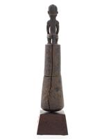 AFRICAN CARVED WOOD PESTLE WITH A YOMBE FIGURE ON TOP