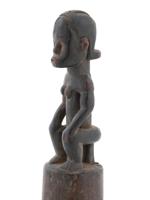 AFRICAN CARVED WOOD PESTLE WITH A YOMBE FIGURE ON TOP