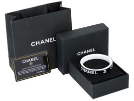 CHANEL BLACK AND WHITE LOGO BANGLE BRACELET IOB