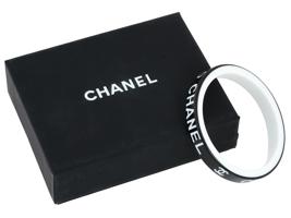 CHANEL BLACK AND WHITE LOGO BANGLE BRACELET IOB