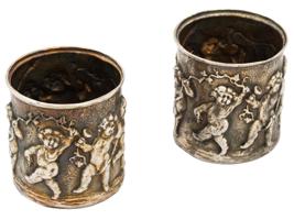 PAIR OF RUSSIAN GILT SILVER SHOT CUPS WITH CUPIDS