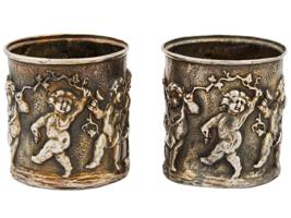 PAIR OF RUSSIAN GILT SILVER SHOT CUPS WITH CUPIDS