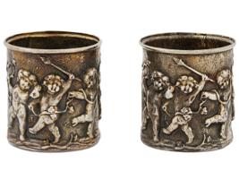 PAIR OF RUSSIAN GILT SILVER SHOT CUPS WITH CUPIDS