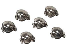 GROUP OF SIX GERMAN WWII TOTENKOPF INSIGNIAS