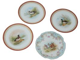 LOT OF FOUR DECORATIVE FRENCH LIMOGES PLATES
