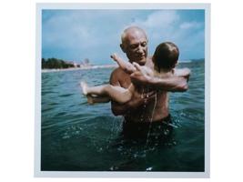 PABLO PICASSO WITH HIS SON PHOTO BY ROBERT CAPA