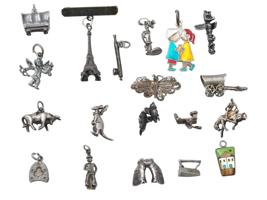 COLLECTION OF VINTAGE STERLING SILVER CHARMS