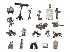 COLLECTION OF VINTAGE STERLING SILVER CHARMS