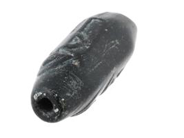 ANCIENT CYLINDER SEAL CARVED FROM BLACK STONE