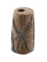 ANCIENT CYLINDER SEAL CARVED FROM BROWN STONE