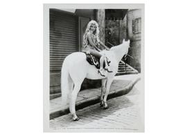 1965 PHOTOGRAPH OF GINA LOLLOBRIGIDA ON HORSEBACK