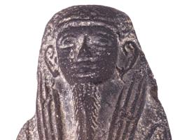 EGYPTIAN BLACK POTTERY USHABTI WITH HIEROGLYPHICS