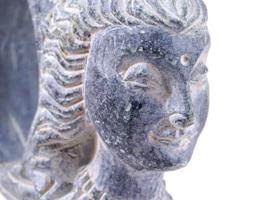 GANDHARA SCHIST RING WITH THE HEAD OF A GODDESS